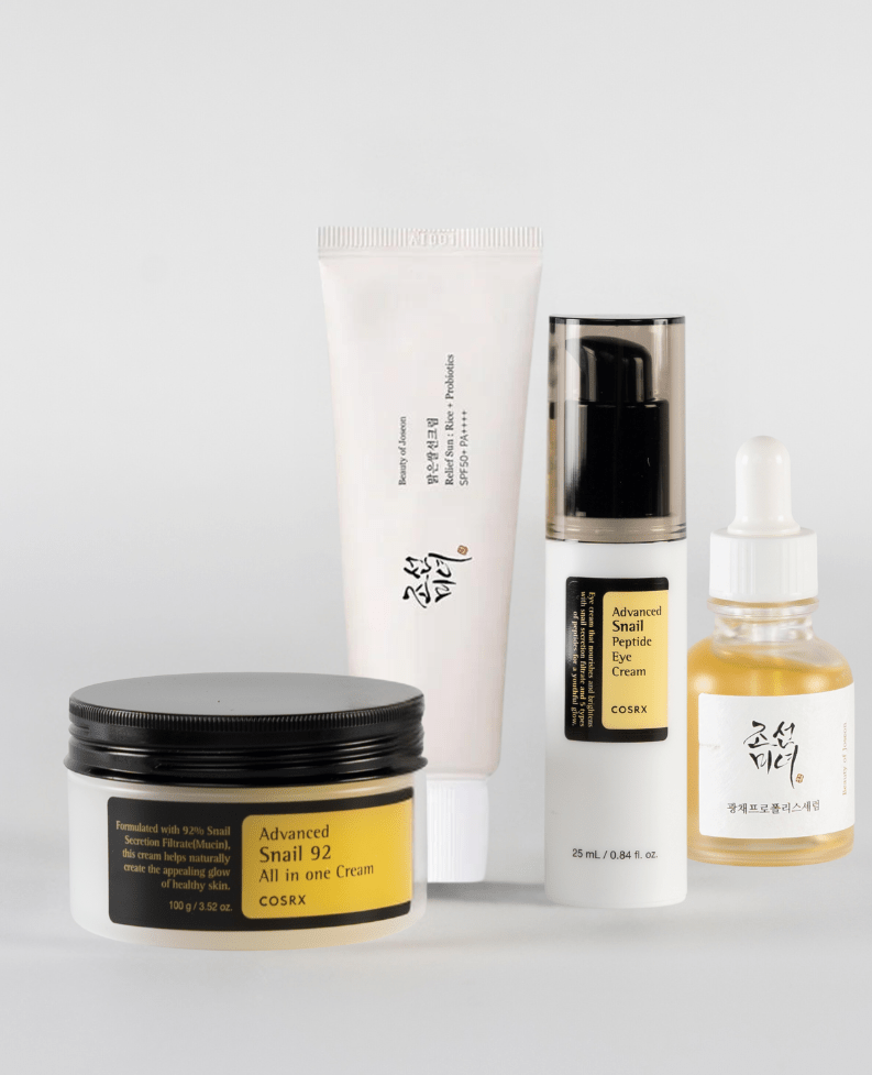 A set of products. Advanced Snail Peptide Eye Cream, Glow Serum: Propolis + Niacinamide, Relief Sun: Rice + Probiotics, Advanced Snail 92 All In One Cream